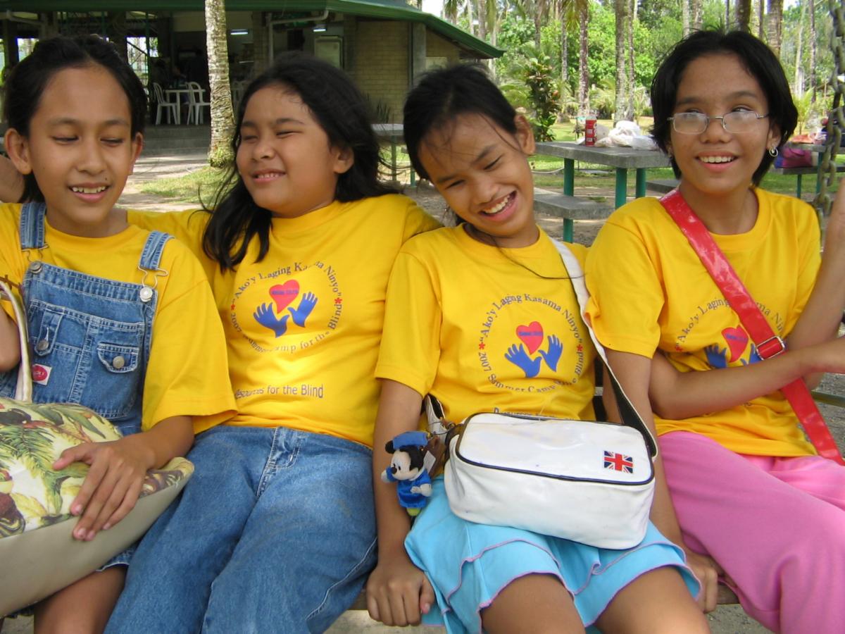 Four girls enjoying camp